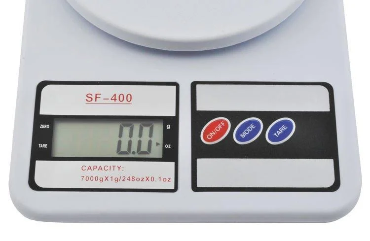 { "alt_text": "Digitale LCD-Küchenwaage bis 10 kg" }