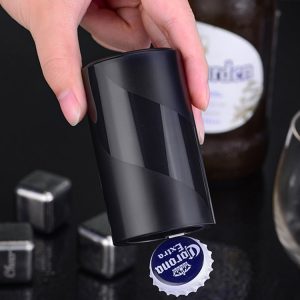 Avtomatski odpirač za kovinske zamaške steklenic