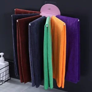 Samolepicí nástěnný držák na kuchyňské utěrky