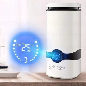 { "alt_text": "Diffuseur LED avec écran LCD, huiles essentielles et télécommande" }