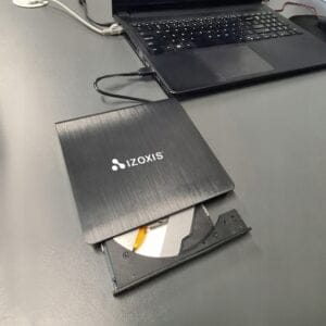 a laptop with a cd in it