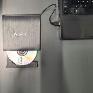 a laptop with a cd in it