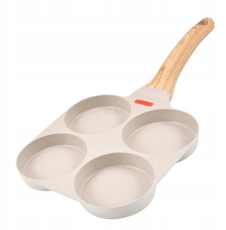 a pan with four holes in it