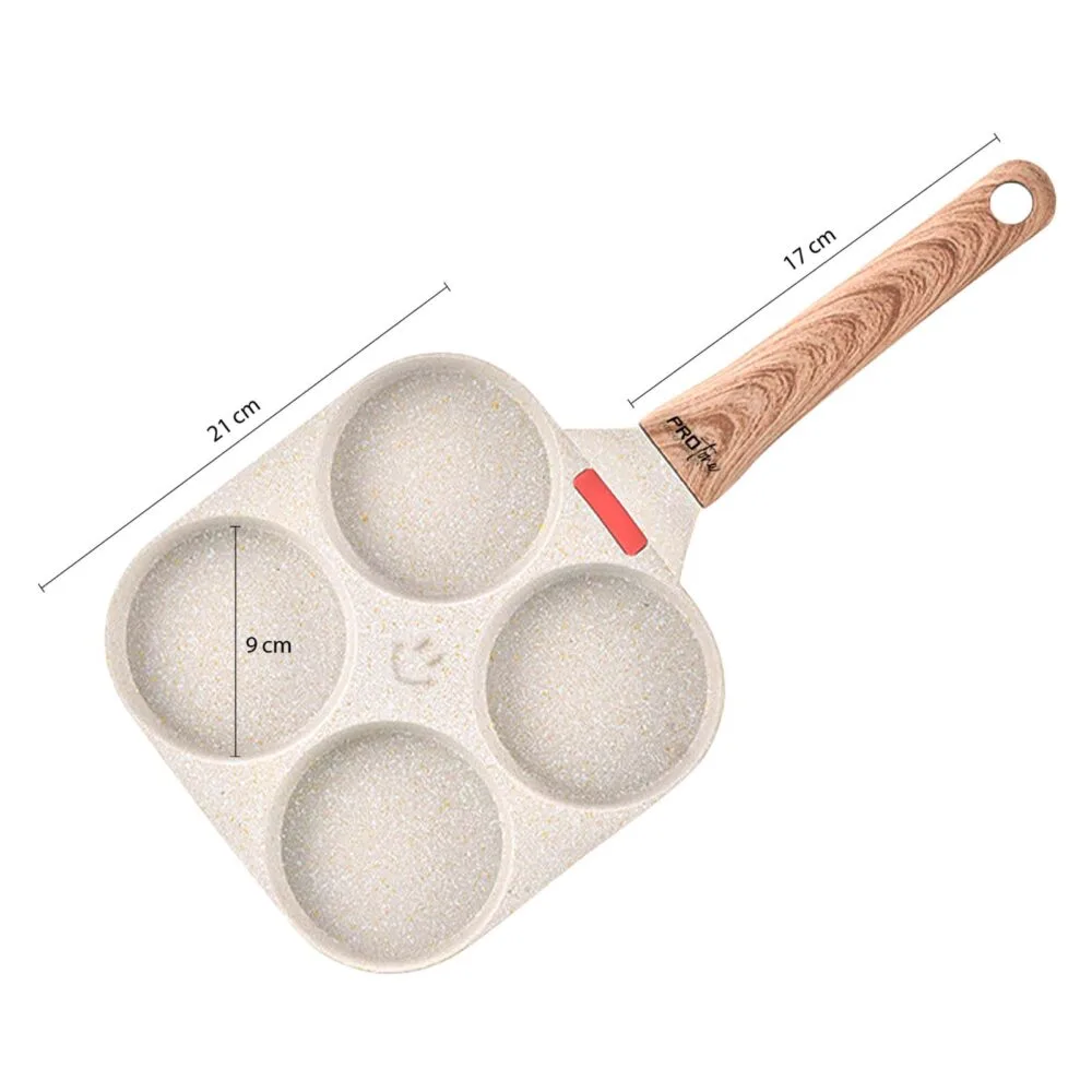 a pan with a handle and four circles