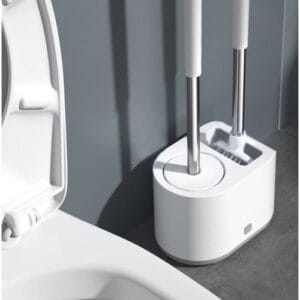 a toilet brush and toilet bowl