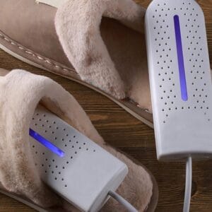 a pair of slippers with a blue light