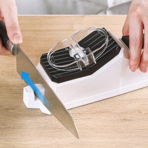 a person cutting a knife